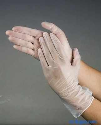 guanto eliminabile del vinile dell'esame medico